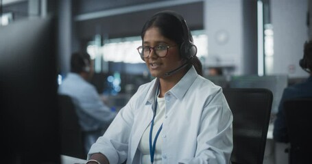 Poster - Portrait of a Help Desk Specialist Having a Conversation on a Call, Providing Technical Support to Client Experiencing Software Issues. Indian Female Using a Headset to Talk with a Tech Team