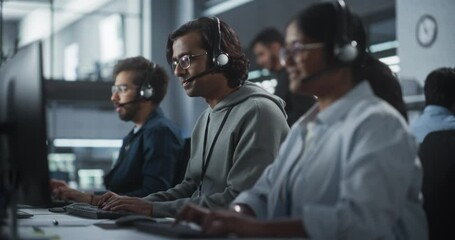 Poster - Help Desk Specialist Answering a Call, Providing Technical Support to Client Experiencing Computer Hardware and Software Issues. Indian Male Using a Headset to Have a Conversation with a Tech Team
