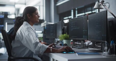 Poster - Young Female Artificial Intelligence Engineer Working on Computer in a Technological Office. Young Indian Specialist Writing Software Code for an Innovative Big Data Blockchain Project