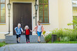 © Yulia Raneva - Happy caucasian children running from school with backpacks on sunny day. Begining of academic year