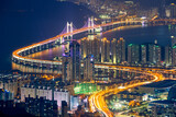 Fototapeta Nowy Jork - Busan cityscape with skyscrapers and Gwangan Bridge illuminated at night. Busan. South Korea