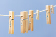 Wooden clothespin on the rope for drying clothes