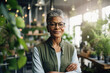 © Trinette Reed - Portrait of confident mature Black woman small business owner in her plant retail shop. Generative AI.