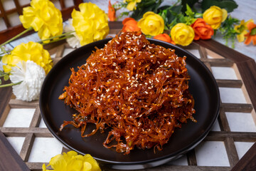 Wall Mural - Korean food side dish Stir-fried dried squid