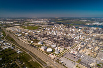 Aerial view of Chemical factory nearby Houston in Texas. Refinery is making gas and diesel for gas station and truck stops. 