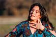 © Cavan Images - Close-up of woman dancing flamenco with hand to heart