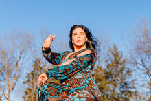 A Beautiful Intense Woman Dances Flamenco Outside