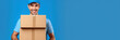 © Katynn - Delivery man holding cardboard boxes isolated on blue background. Courier service Delivery banner. Space for text. Created with generative ai