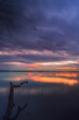 Vertical shot of a vibrant sunset at a lake in Ile Perrot in southwestern Quebec, Canada