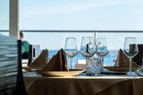 Fototapeta  - tavola imbandita in un ristorante vicino al mare