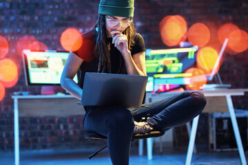 Fototapete - Woman hacker, night and thinking with laptop for glitch, coding and data analysis for information technology. IT code expert, dark web and cyber crime with computer for problem solving on internet
