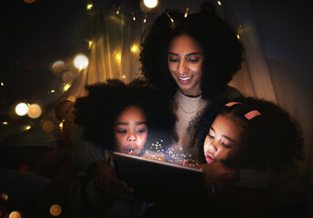 Poster - Tablet, night a mother reading to her kids in a tent while camping in the bedroom of their home together. Black family, story or children with a woman storytelling to her kids at bedtime for bonding