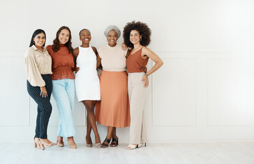 Fototapete - Portrait, teamwork and business women smile in office standing together by white wall mockup. Happiness, diversity and group of friends, employees or staff with cooperation or workplace collaboration