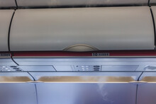 Closed hand luggage compartments in a cabin of passenger plane