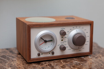 Vintage radio receiver on a marble countertop, close-up