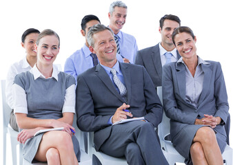 Poster - business team during a meeting