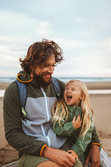 Wall Mural - Family father with child outdoor dad with daughter happy laughing face vacations lifestyle together candid emotions
