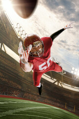 Wall Mural - Wide angle view of american football player jumping and catching ball and making an amazing play during a game. 3D model, collage, poster