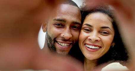 Poster - Couple, smile and heart hands in home for face, love or romance, affection or care. Emoji, interracial portrait and black man and funny woman laugh with hand gesture for bonding, trust or commitment.