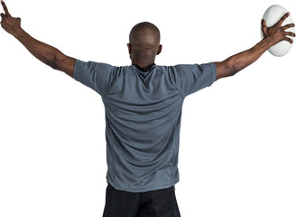 Poster - Rear view of sportsman with arms raised holding rugby ball