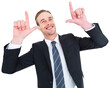 Happy businessman pointing with fingers