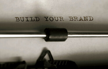 Poster - Text Build Your Brand typed on retro typewriter