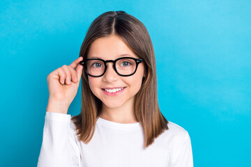 photo of positive girl with long hairstyle wear white long sleeve finger touch glasses on checkup is