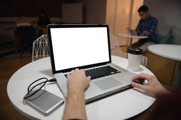 Poster - Cropped hands of male executive using laptop