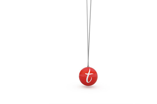 Digital composite image of red newtons cradle with alphabet t