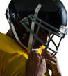 American football player wearing helmet