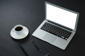 Canvas Print - Black coffee, pen, organizer and laptop on black background