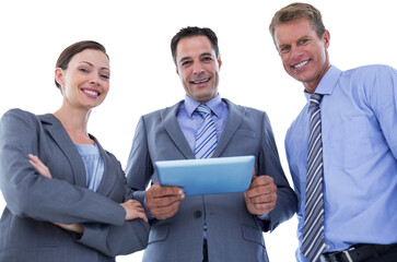 Sticker - Business colleagues smiling at camera and holding tablet