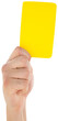 Cropped image of referee holding yellow card