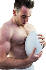 Canvas Print - Shirtless rugby player holding ball