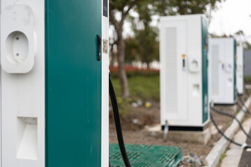 Wall Mural - Electric car charging pile in the parking lot