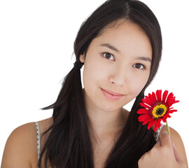 Smiling woman holding flower