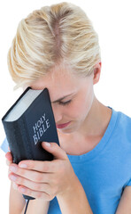 Wall Mural - Pretty blond woman holding bible