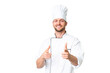 © luismolinero - Young caucasian chef over isolated chroma key background pointing to the front and smiling