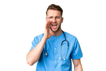 Wall Mural - Young nurse man over isolated chroma key background shouting with mouth wide open