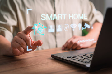 Poster - Iot smart home automation app concept. Adult man controlling technology AI smart home devices using a laptop computer with launched application in the bed room.
