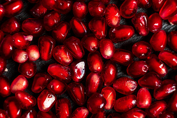 Wall Mural - red delicious grains of ripe pomegranate