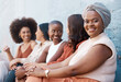 © Nina Lawrenson/peopleimages.com - Black woman, portrait smile and waiting room with team in collaboration for hiring or recruitment in row at office. Creative African female smiling in teamwork, leadership or management for startup