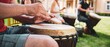 Engaging scene of learning to play the Djembe drums, with focused attention on rhythm and beats.