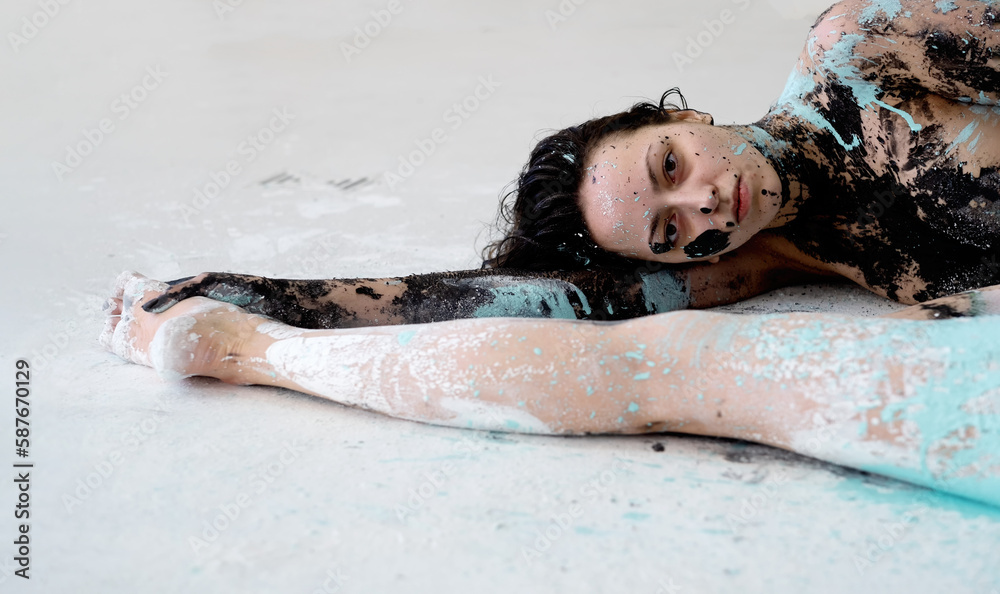 Portrait and upper body and legs of two abstract painted young sexy