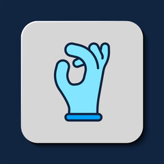 Sticker - Filled outline Medical rubber gloves icon isolated on blue background. Protective rubber gloves. Vector