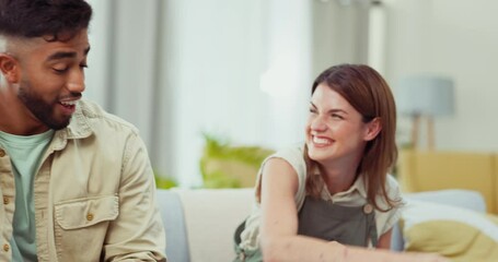 Sticker - Couple, watching tv or fight for remote on sofa in living room for playing, care or interracial love. Indian man, caucasian woman or funny game for choice of television show, relax and couch in house