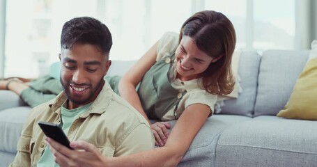 Poster - Phone, comic and happy couple relax on a sofa, laughing and sharing social media meme in their home. Funny, joke and man with woman checking smartphone for silly text, app or message in a living room