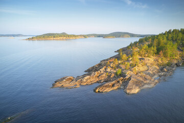 Poster - Island on lake during sunset, aerial view.