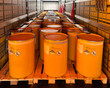 © yarm_sasha - Loading, transportation and unloading of barrels with hazard class 9 in a semi-trailer. Transportation of dangerous goods by ADR cargo transport