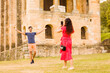 © Sangiao_Photography - woman take a photo with smartphone to a man in Santa Maria del Naranco oviedo, Asturias Church.